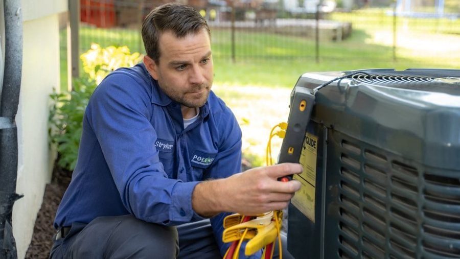 Polestar HVAC tech performing AC maintenance
