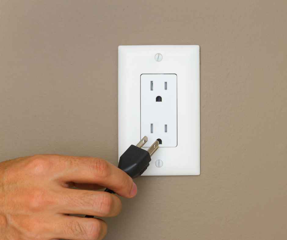 Plugging a device into an outlet