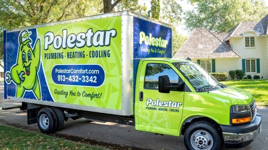 Polestar van sitting outside home.