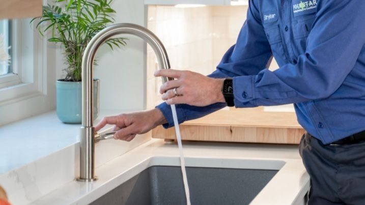 Polestar plumbing test faucet after repairing water line.
